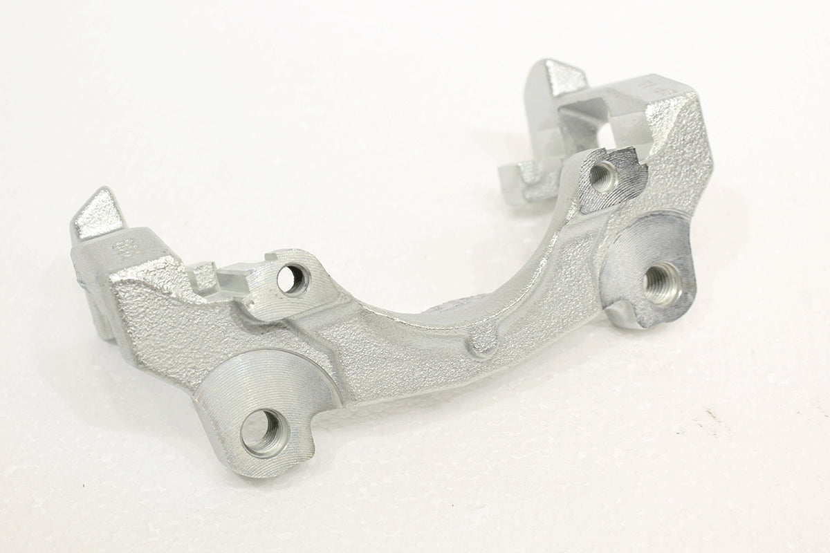 LR000567 LAND ROVER - CARRIER-BRAKE CALIPER-FRONT 2.2EFI 2.2D L359 From ATE